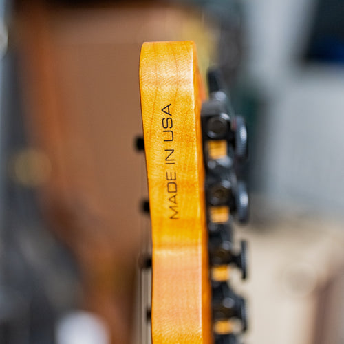 James Tyler USA Tylerbastar in Fire Shmear with a roasted Birdseye Maple Neck
